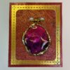 Hand crafted pendant in red pink and purple