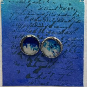 Gift: Cufflinks in blue and white set in silver-coloured bezels and domed with resin