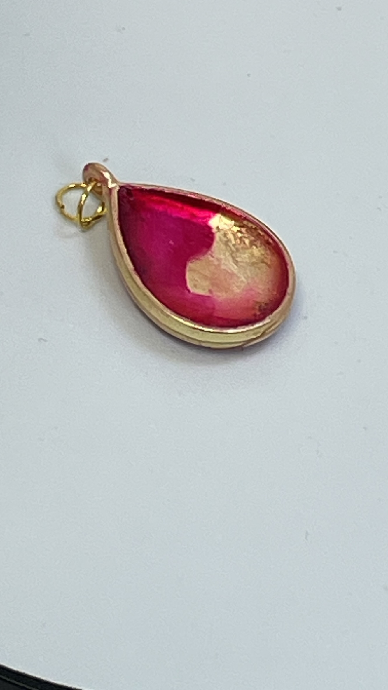 Pendant: reverse of pink tear-drop shape