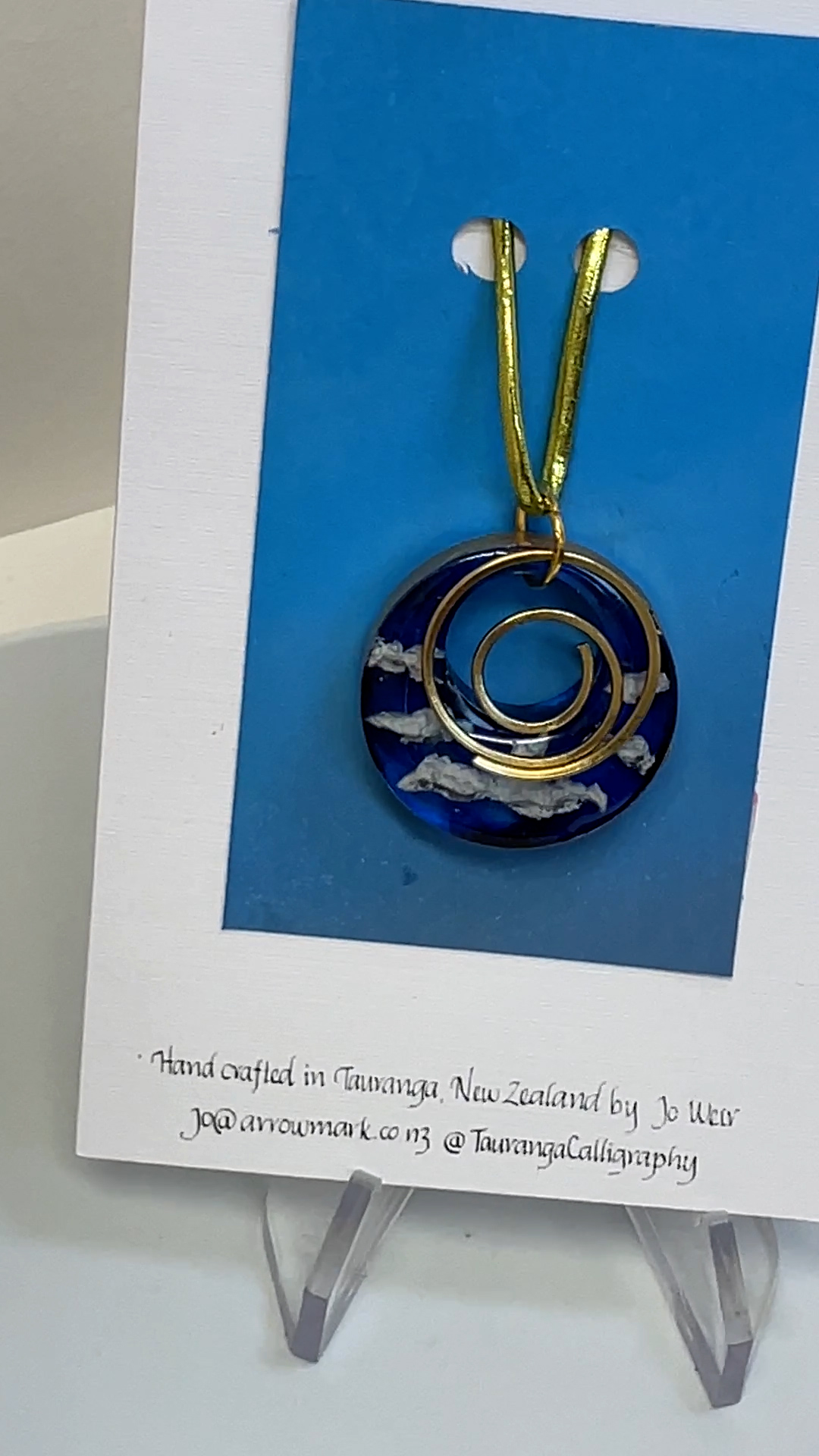 Pendant: blue resin with fluffy white clouds