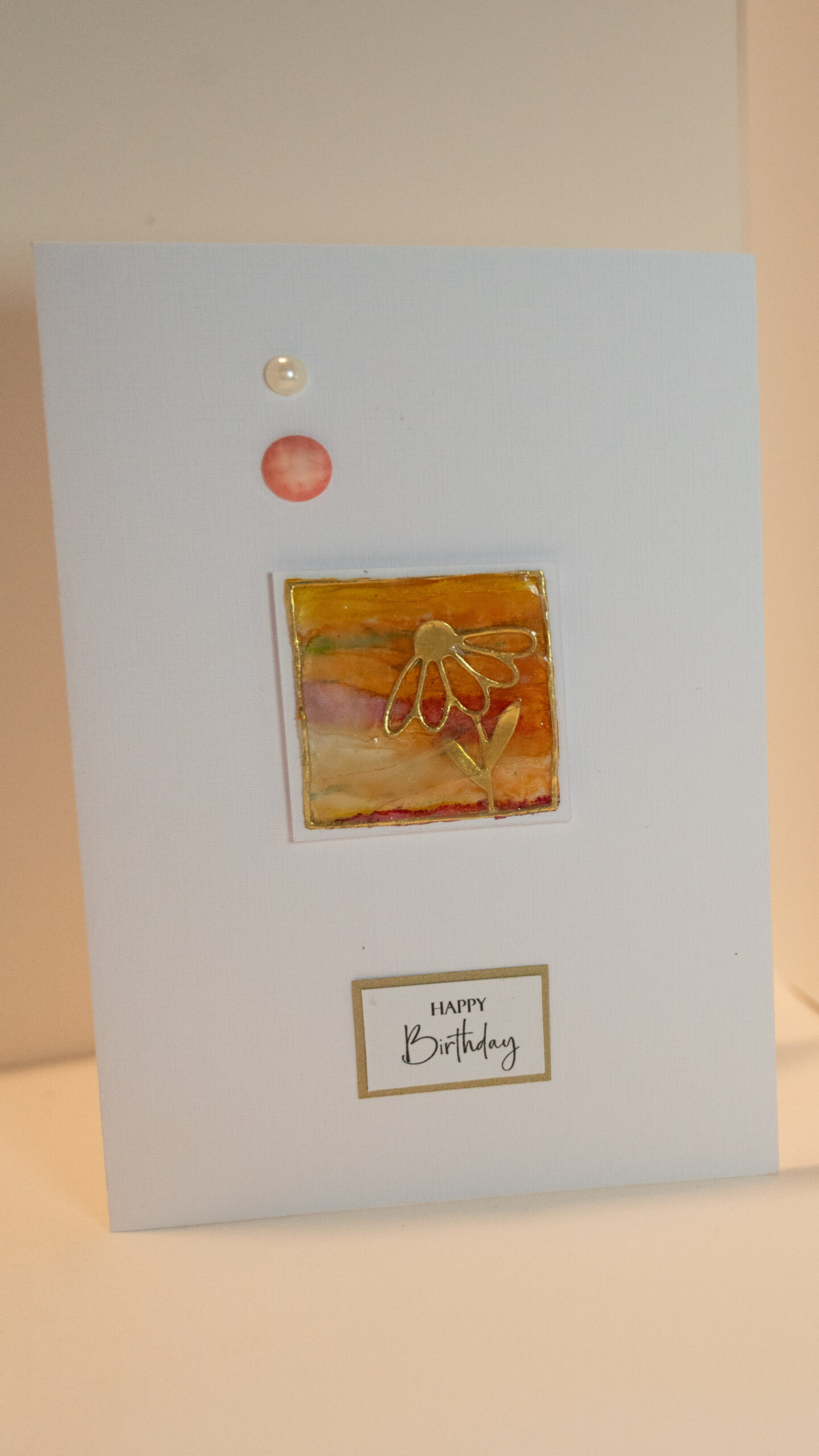 Hand made card: Happy Birthday with gold flower mounted on alcohol ink tissue