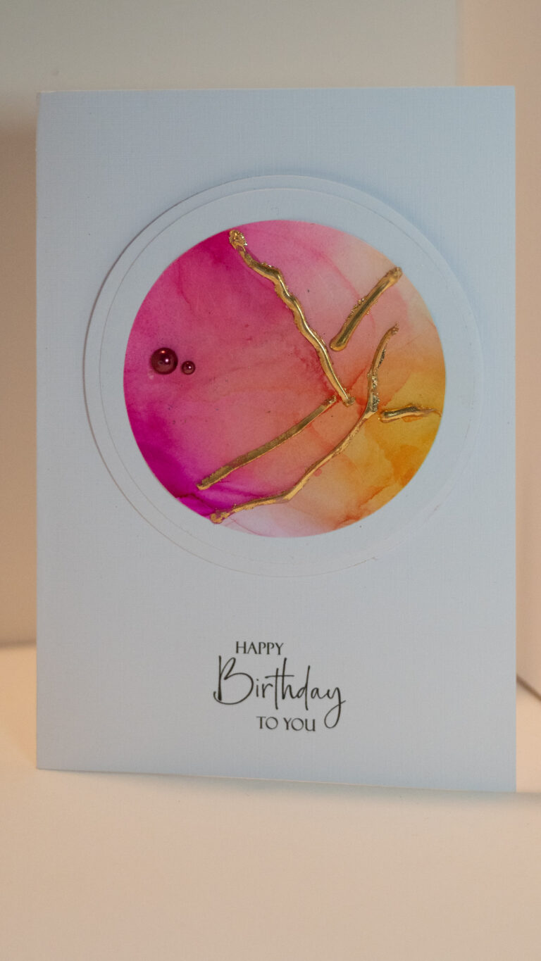 Card: Happy Birthday Wishes. Pink and gold circle with mini bling accents.