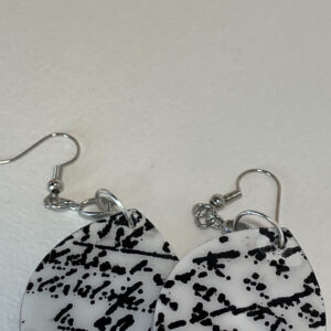 Tauranga Jewellery Hand crafted earrings with embossed black calligraphy, resin and silver ink surround.