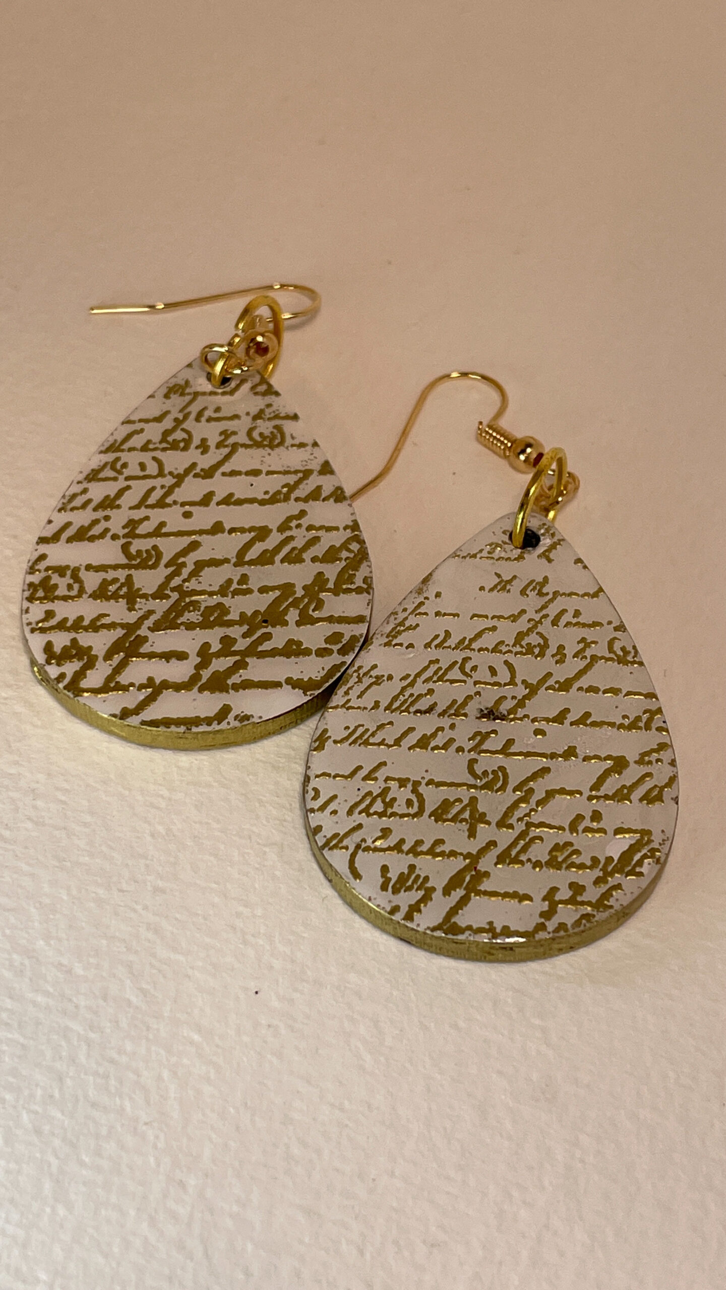 Jewellery: Earrings with gold embossed calligraphy - Tauranga ...