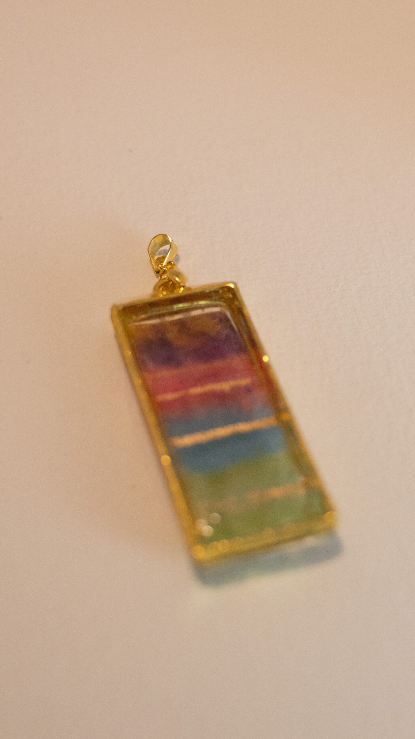 Tauranga Jewellery: Pendant hand crafted from tissue, alcohol ink and resin