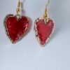 Tauranga Jewellery: Hand made earrings featuring red and gold inks and resin set in gold coloured heart shaped bezels