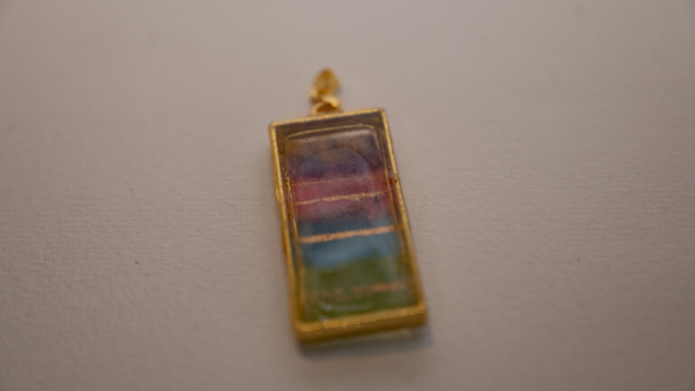 Tauranga Jewellery: Pendant hand crafted from tissue, alcohol ink and resin