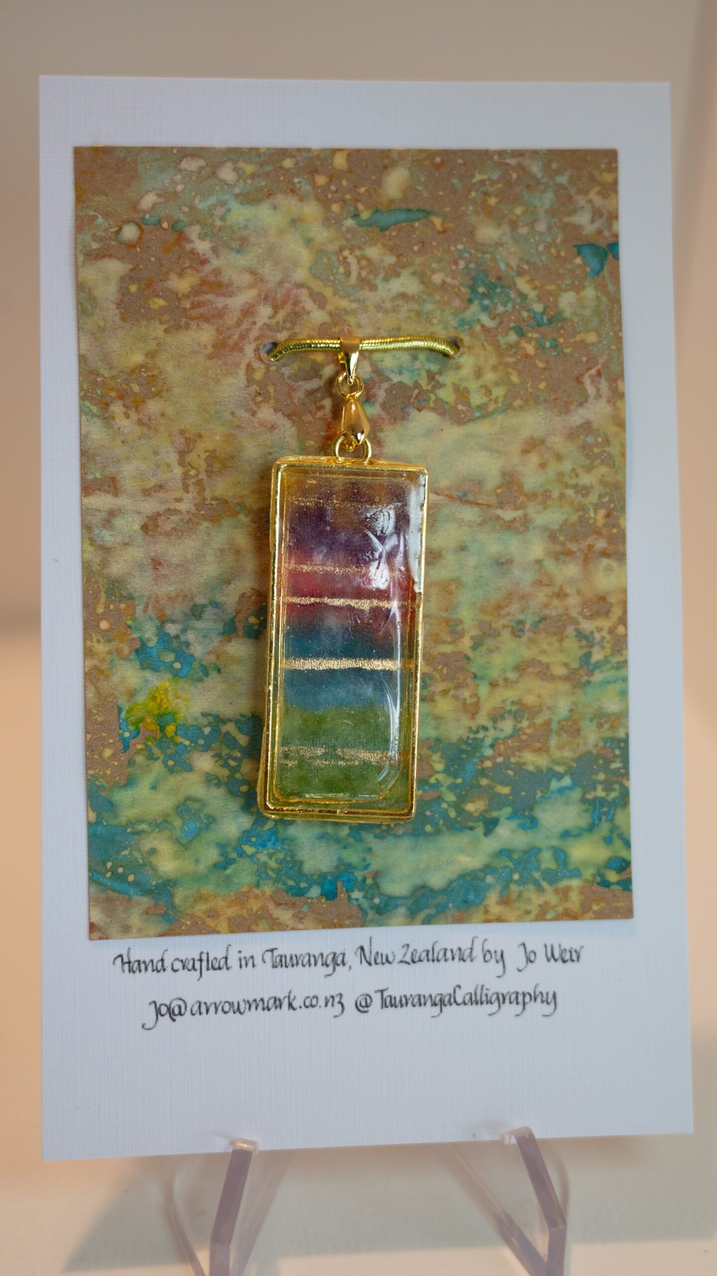 Tauranga Jewellery: Pendant hand crafted from tissue, alcohol ink and resin