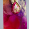 Hand made tear drop shaped pendant in pinks and golds