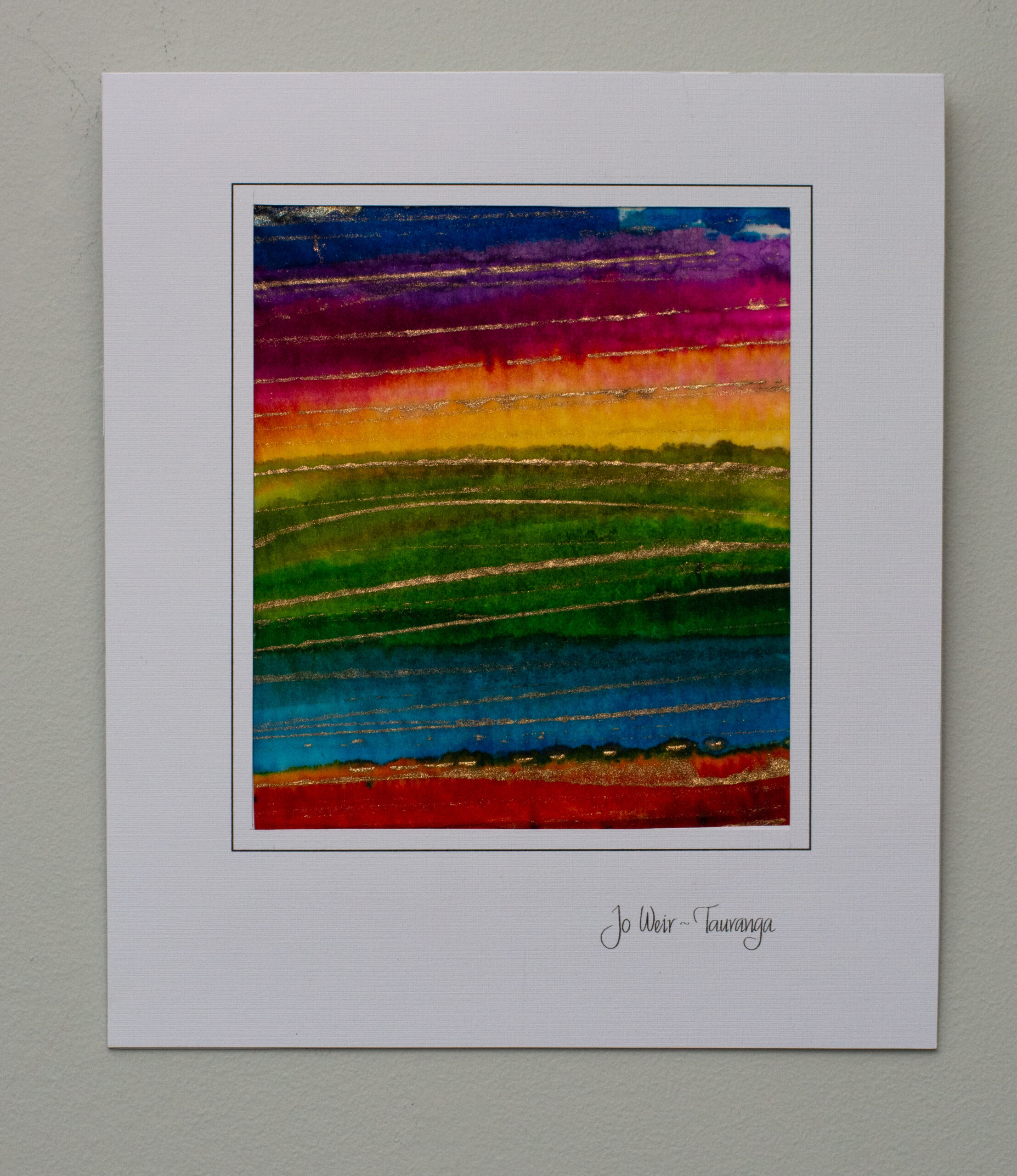This piece is very bright, crafted by hand painting inks on tissue paper, featuring metallic gold highlights. There is vibrant colourful sunset featuring strong purple and orange tones. . NZ MADE