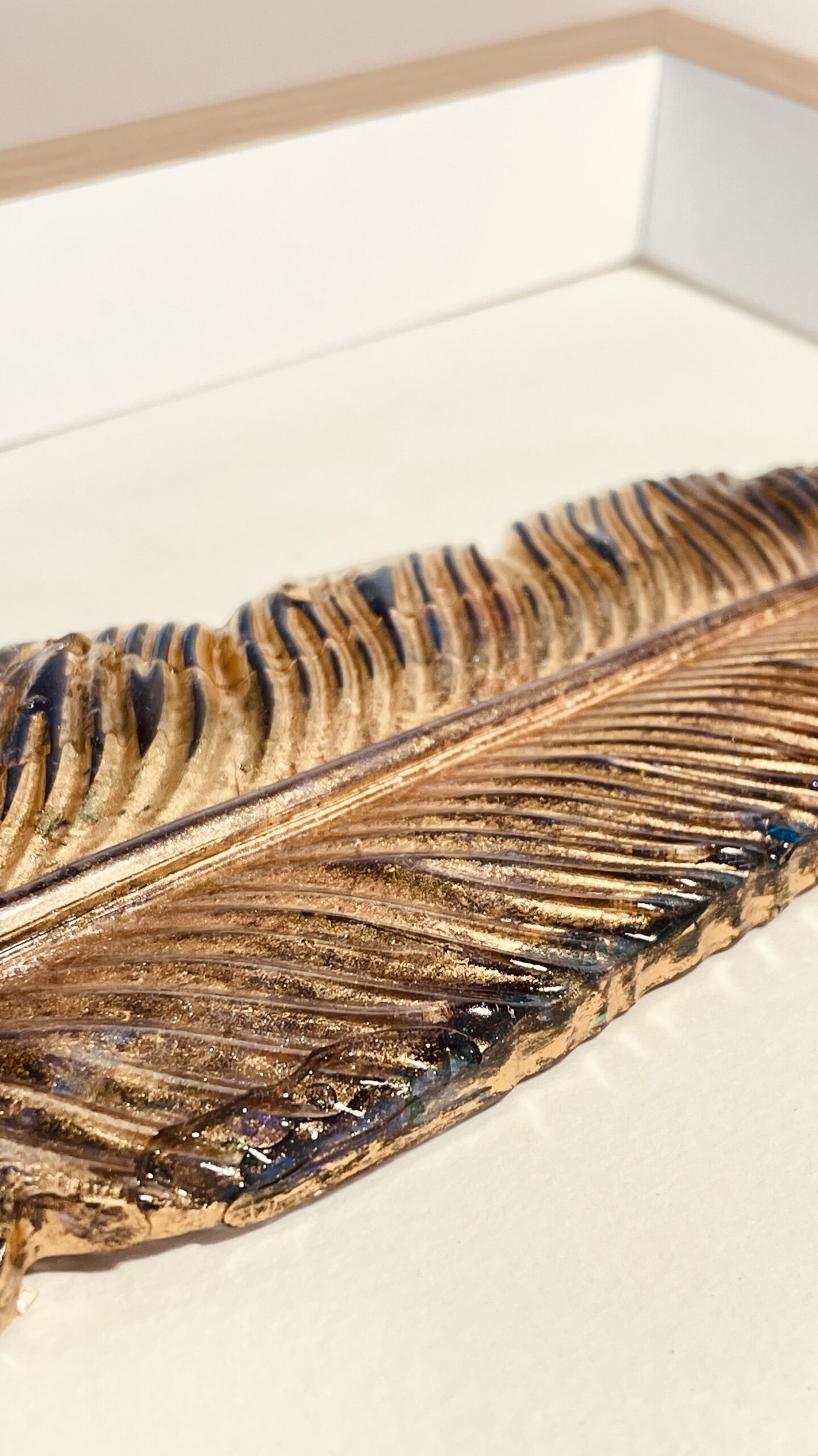Hand made feather in blue and green and gold