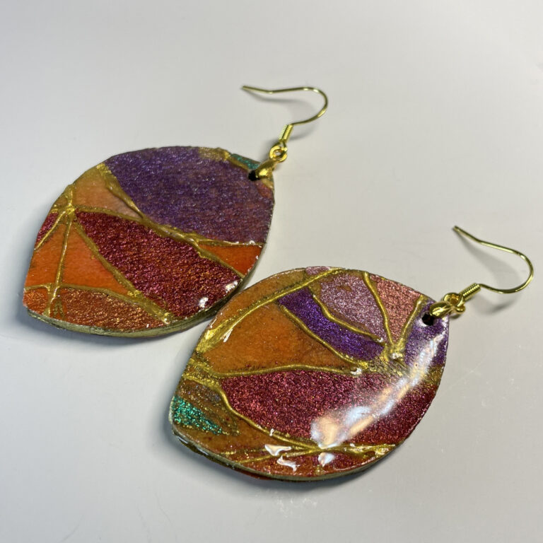 Hand made earrings in gold, green, purple and orange