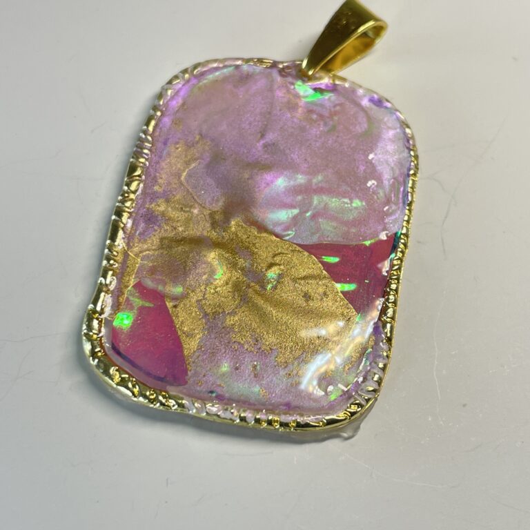 Sparkly pink and gold pendant