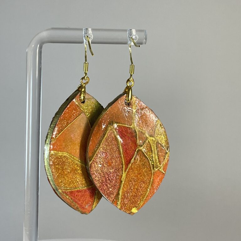 Hand made earrings in gold, green, purple and orange
