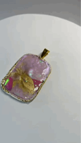Sparkly pink and gold pendant