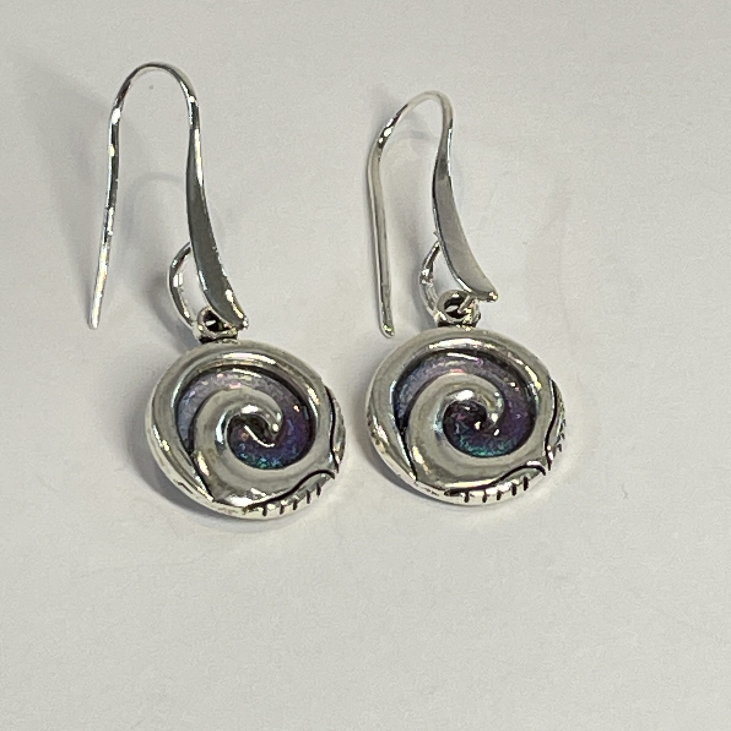 Purple-teal chameleon spiral hand made earrings in NZ” from Bulk EditSilvery red spiral hand made earrings in NZ