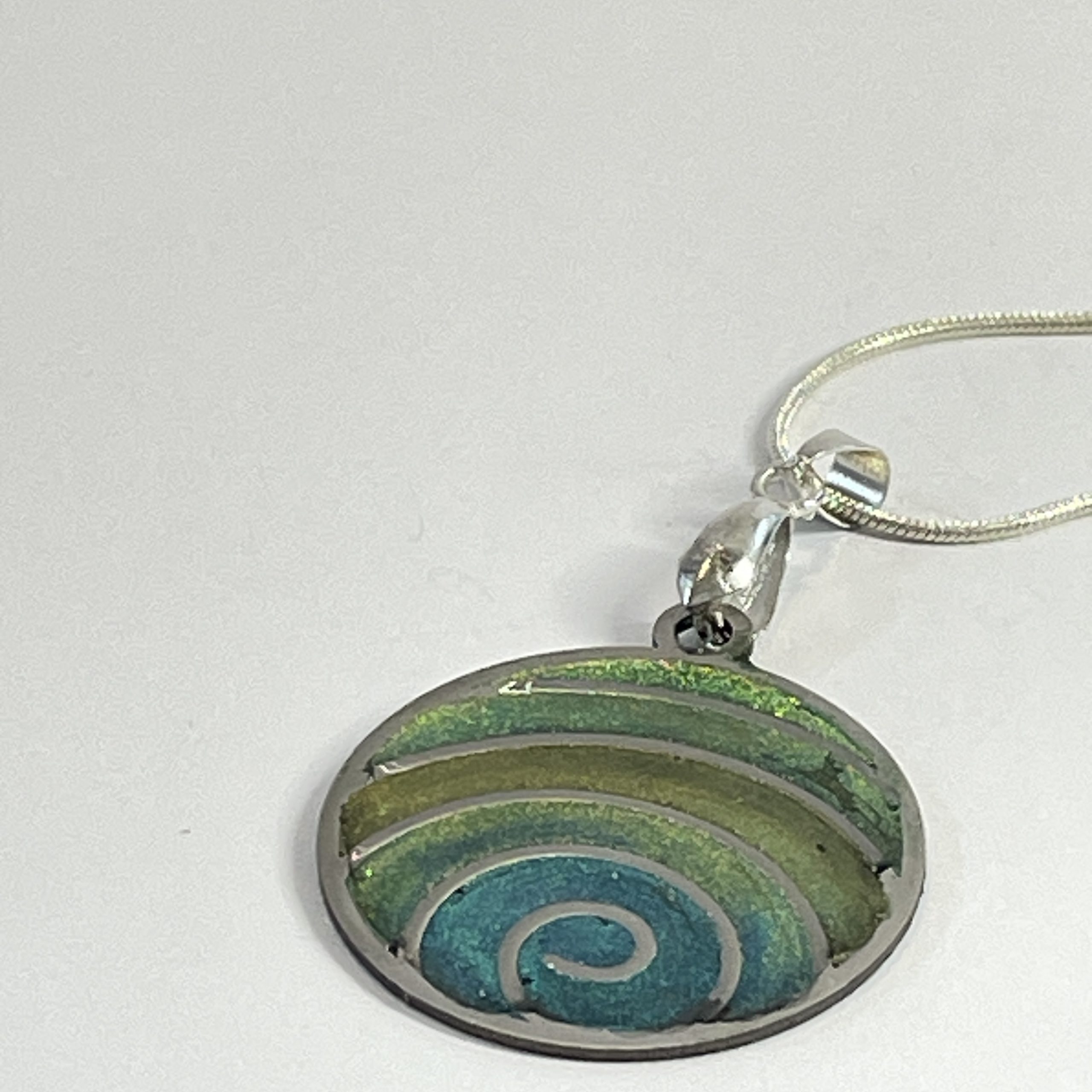 Hand made pendant in multiple green tones