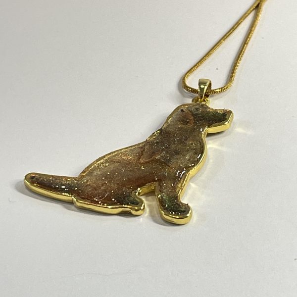 Hand made pendant featuring a gold-coloured labrador dog filled with brown and gold coloured inks
