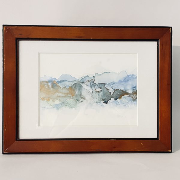 "Mt Maunganui Stormy Surf". Hand painted in Tauranga, this piece has been created with ink on paper featuring blue and green waves reminescent of Mt Maunganui in New Zealand's Bay of Plenty. Metallic gold highlights shine in different lighting conditions.