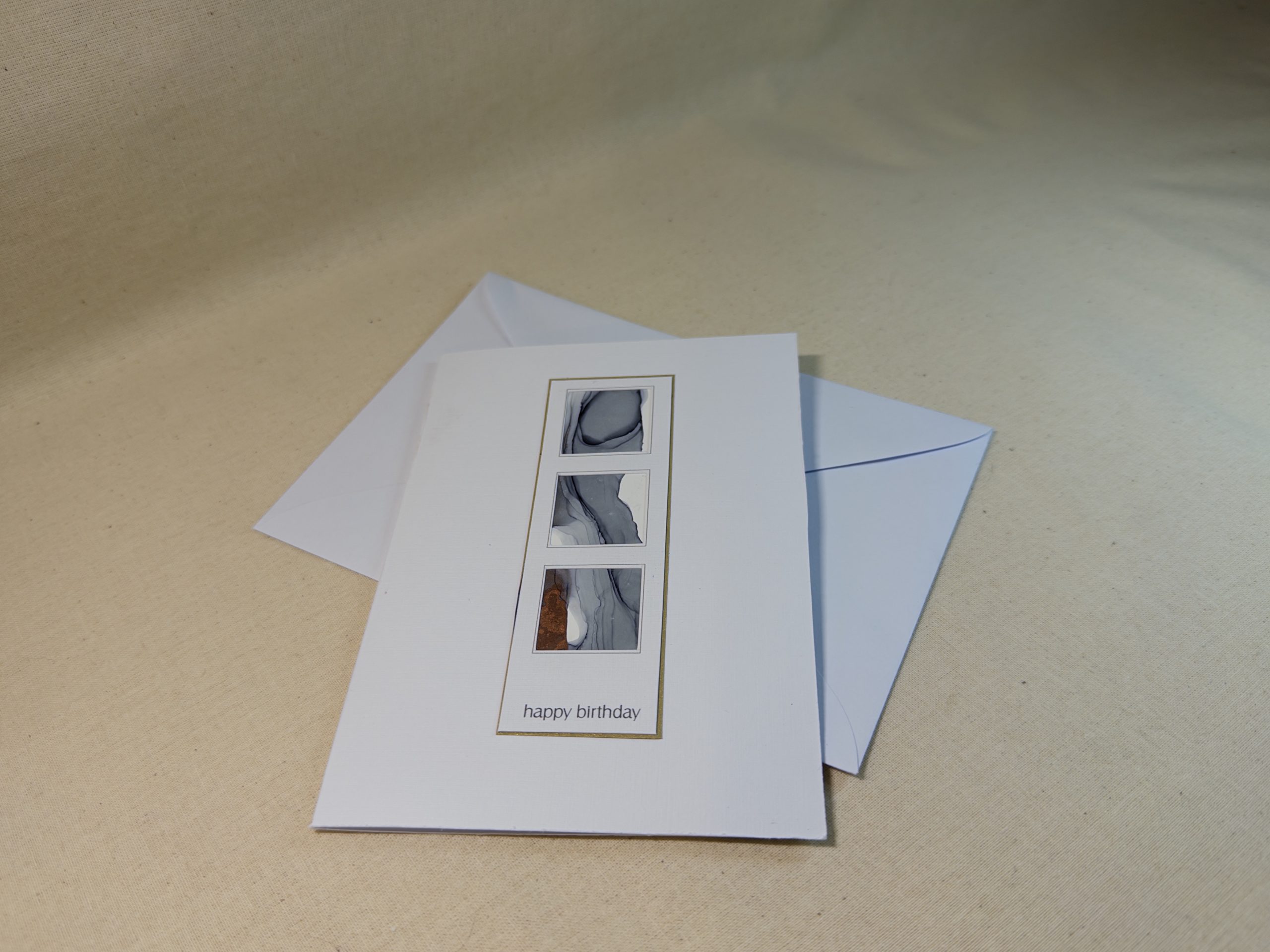 Hand made greeting card featuring grey and copper hand painted art