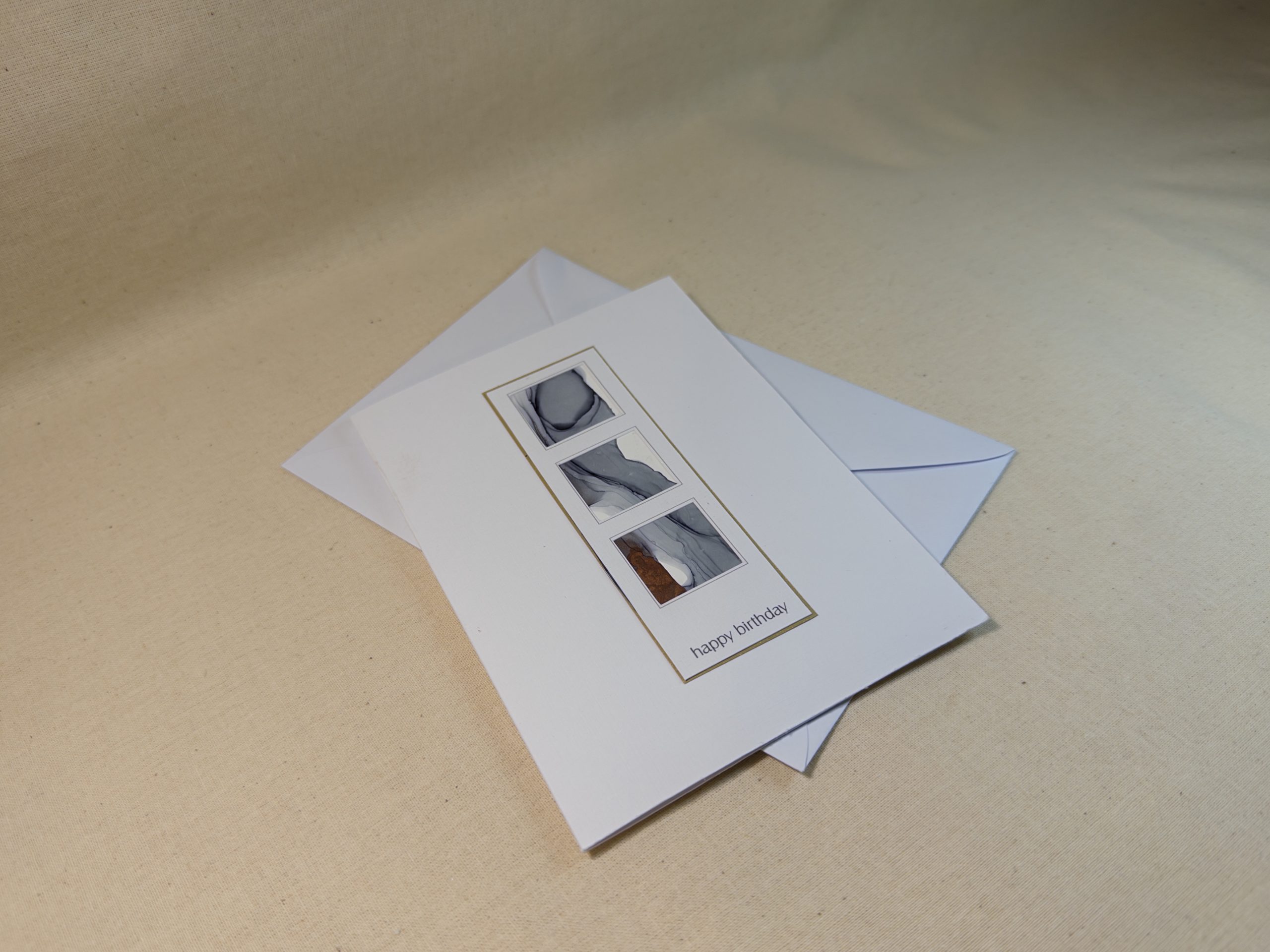 Hand made greeting card featuring grey and copper hand painted art