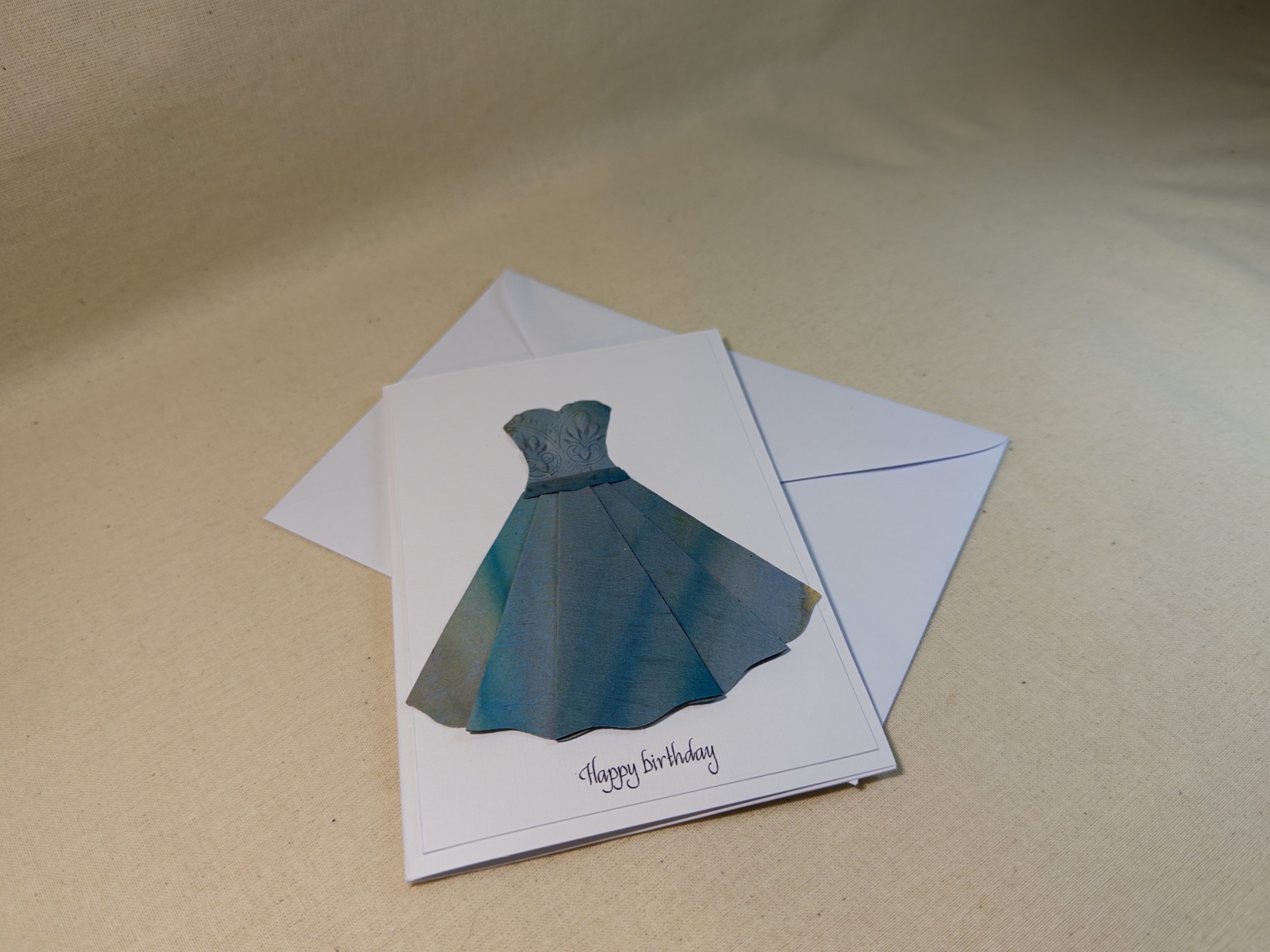 Hand made greeting card featuring floaty embossed and hand painted dress Hand made greeting card featuring floaty embossed and hand painted dress