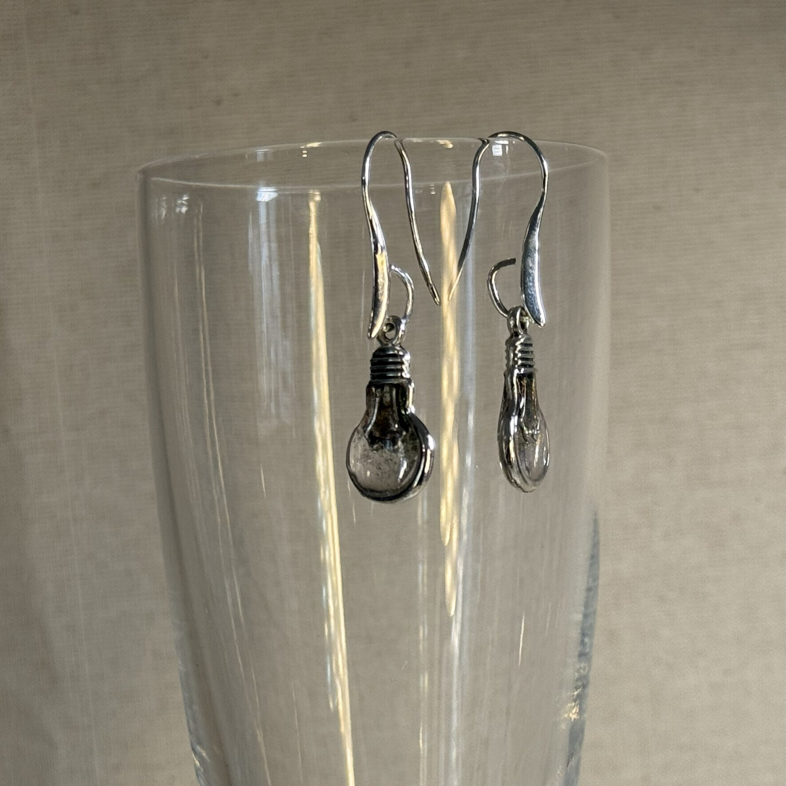 Mini light bulb earrings on metal hooks Mini light bulb earrings on metal hooks